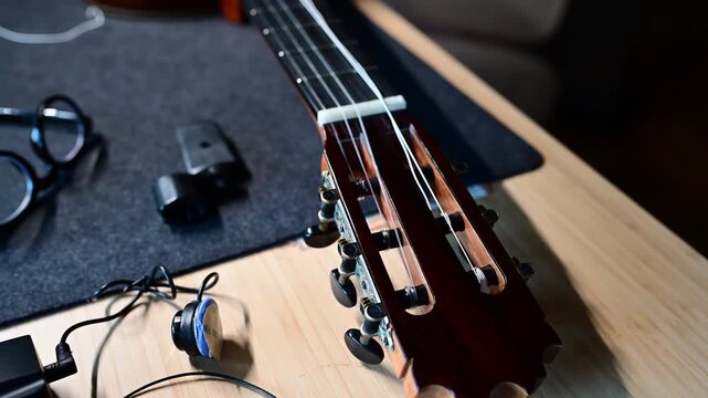 Montage showing the process of changing classical guitar strings