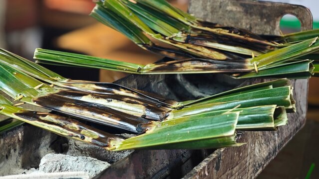 Nipa palm dessert. Sticky rice flour, palm sugar and shredded coconut meat.