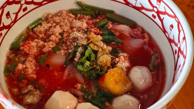 Pink Noodles (fermented bean curd sauce) with fish ball.