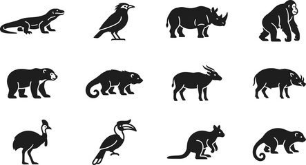 Collection of black silhouette icons featuring various wild animals and birds. © Arzo