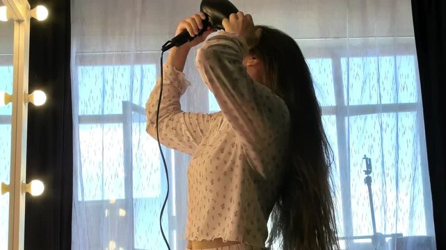 Flipping Long Hair While Blow Drying