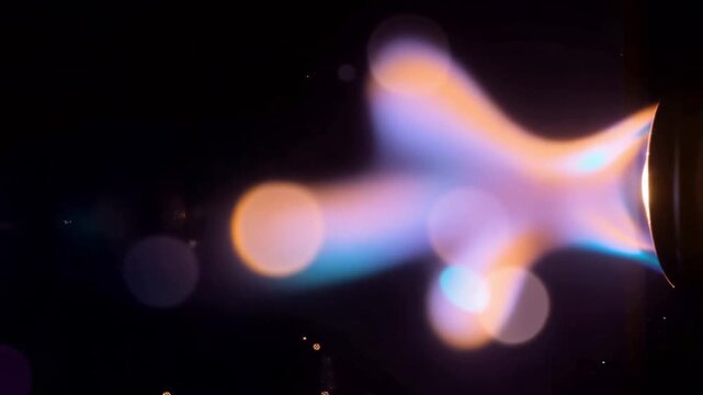 Cinematic Rocket Thruster Jet Engine Flame with Glowing Bokeh Particles