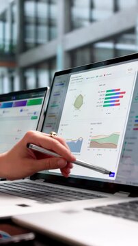Compliance Officer Reviews Dashboard Analytics Using Software
