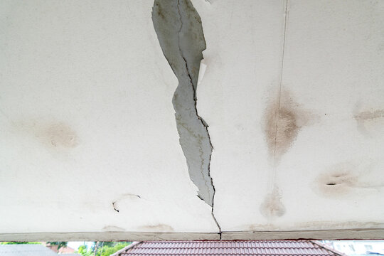 Water stains on the eaves caused by a roof leak.