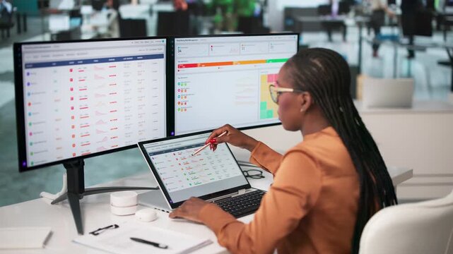 Risk Manager Reviewing Supplier Data On Laptop