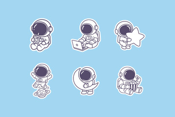 Cute little astronauts performing various daily activities like drinking boba tea using a laptop and eating popcorn as sticker designs © DzgnVibe