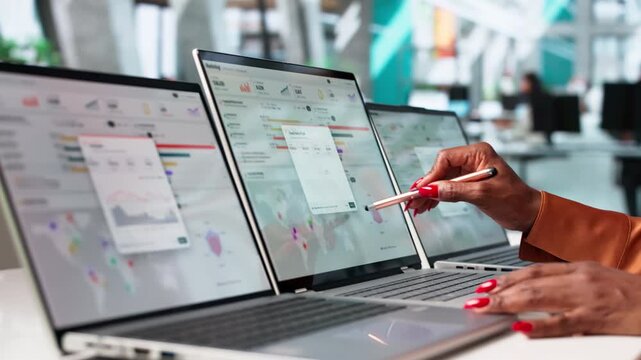 Marketing Manager Analyzes Campaign Data On Laptop