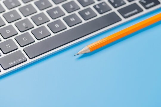 Office supplies on blue desk