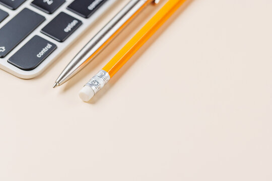 Office supplies on beige desk