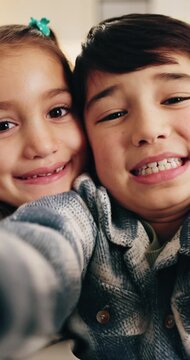 Face, children and selfie in home with smile, photography and social media post for bonding. Pov, portrait and embrace at house with siblings, profile picture update and capture moment for affection
