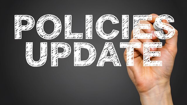 Policies update concept with handwritten text for business compliance and organizational management