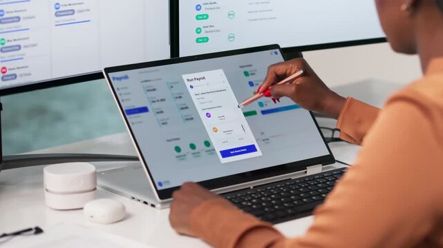 Human Resources Manager Using Payroll Software
