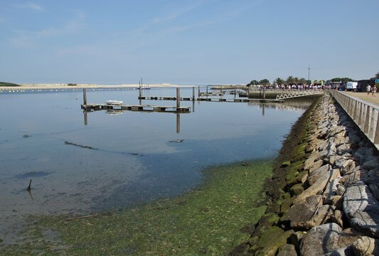 Coastal lagoon with floating docks and calm water. Esponede, Norte - Portugal