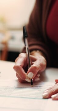 Woman, hands or signing with documents in home for financial contract, investment or legal agreement. Female person, writing or signature with application, form or paper for finance or asset in house