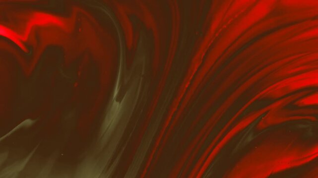 Mesmerizing abstract background of liquid marble texture with dark red and olive green swirling ink pattern. Elegant fluid motion perfect for modern creative projects.