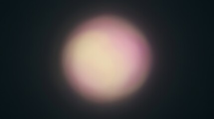 Fototapeta premium Abstract Blurred Light Circle with Soft Pink and Yellow Tones on Dark Background
