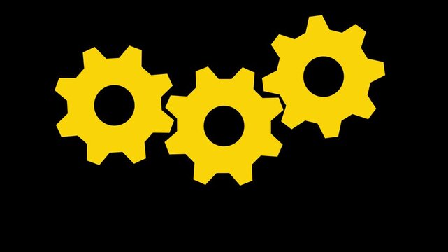 Animated yellow gear cogs rotating on black background: industrial engineering and business process concept