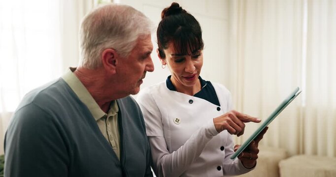 Caregiver, tablet and talk in retirement home with old man, medical report or advice for wellness. Healthcare worker, tech and senior person with discussion, help or online test results for diagnosis