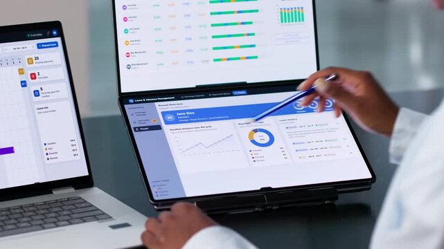 Human Resources Manager Reviews Absence And PTO Requests