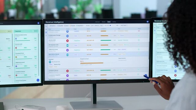 Sales Manager Studies Pipeline Data On Her Computer