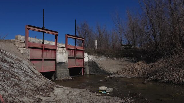 an abandoned open sluice for watering and irrigating fields and farmland