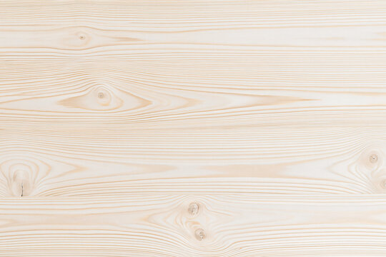 Natural light pine wood texture background with organic knots