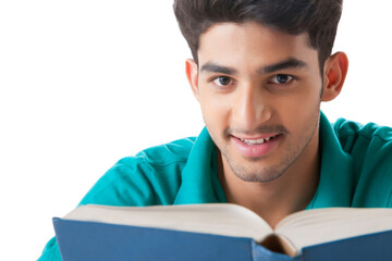 Obraz premium Young man Reading a Book