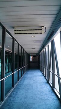 Interior View of Airport Passenger Boarding Bridge Tunnel Walkway