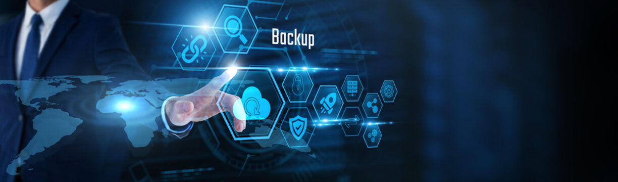 Businessman touch Backup, and storage data. Cloud backup solutions, secure data protection, disaster recovery planning, business continuity, cybersecurity, enterprise file management.