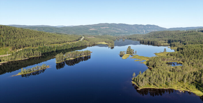 Norwegian lakes and forests with reflections, Buskerud, Norway
