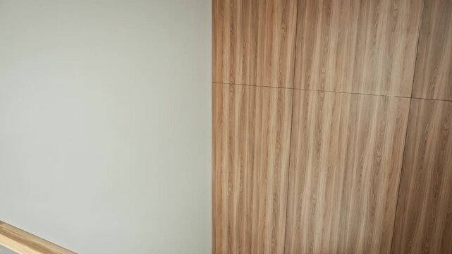 Elegant Hotel Staircase. Chic Hotel Staircase Incorporating Glass Balustrade And Warm Wood Accents