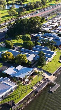 Aerial View of Luxury Waterfront Homes and Highway Traffic in Australia
