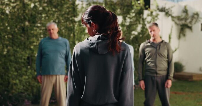 Fitness, trainer and people with outdoor class for senior wellness, health and shoulder shrug. Retirement group, instructor or workout with neck exercise for pilates, practice or training in backyard