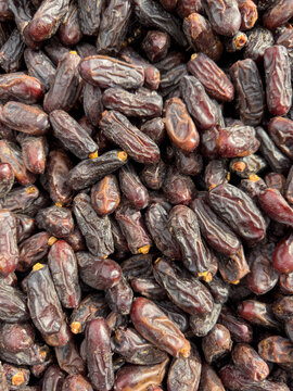 Sweet dried dates at a grocery market stall