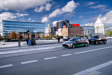 Copenhagen city center with parked taxis and people, an urban scene in Denmark. © Tomasz