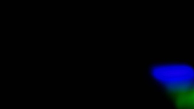 Prism light leak with chromatic aberration drifting showing rainbow color spectrum for cinematic overlay transition