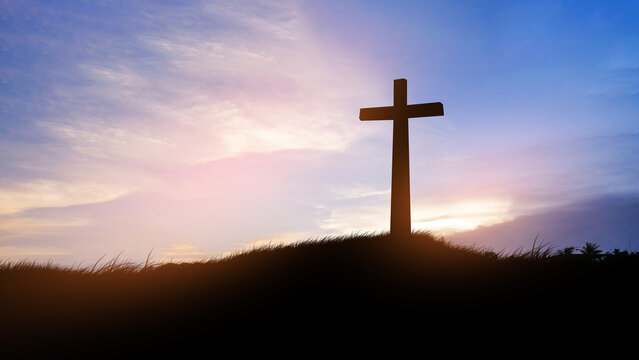 cross on blurry sunset background .	
