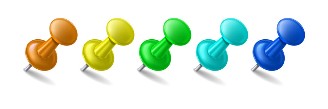 Set of five colorful plastic push pins with metal needles and shadows isolated on a transparent background