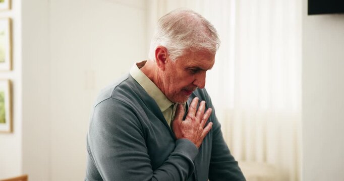 Stress, chest pain and senior man in home with discomfort, angina or heart attack symptoms. Respiratory illness, medical emergency and elderly person with cardiac problem, asthma or artery disease.