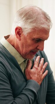 Stress, old man and breathe in home with chest pain, heart attack or panic for medical condition. Discomfort, senior person and angina at house with cardiac arrest, lung infection and chronic illness