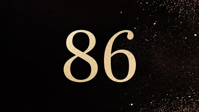 Gold Glitter Blow‑Away Reveal of Number 86 on Solid Background