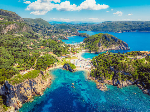 Agios Spiridon Beach with crystal  azure water and beach with scenery of coastline of Corfu island near Monastery of Paleokastritsa, Ionian sea in Greece