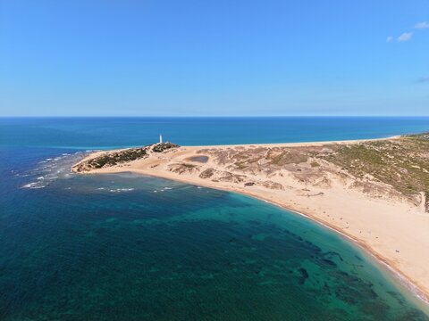 Faro de Trafalgar, aerial view of the lighthouse at a sandy headland with dunes between Los Ca&ntilde;os de Meca and Zahora, Conil de la Frontera, Vejer de la Frontera, Costa de la Luz, Andalusia, Spain