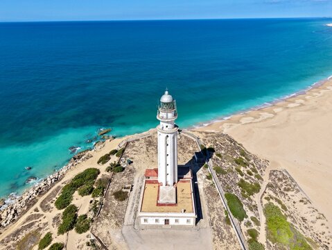 Faro de Trafalgar, aerial view of the lighthouse at a sandy headland with dunes between Los Ca&ntilde;os de Meca and Zahora, Conil de la Frontera, Vejer de la Frontera, Costa de la Luz, Andalusia, Spain