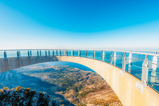 Panoramic view from Skywalk Biokovo glass platform overlooking Makarska Riviera, Adriatic sea and islands, Biokovo Nature Park, Croatia.