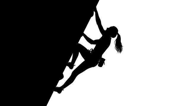 Silhouette of a woman rock climbing on a steep mountain