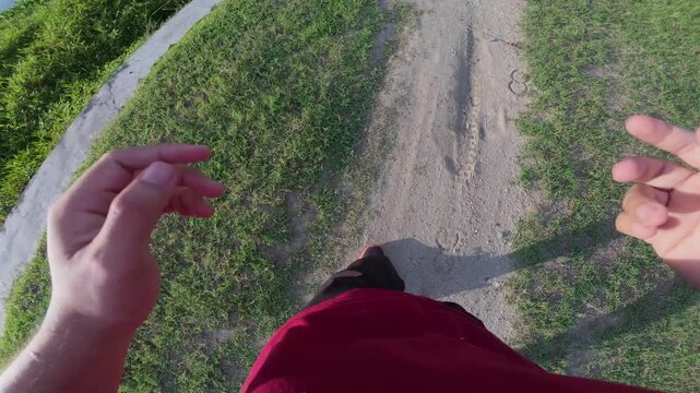 POV Running on Path Next to Water