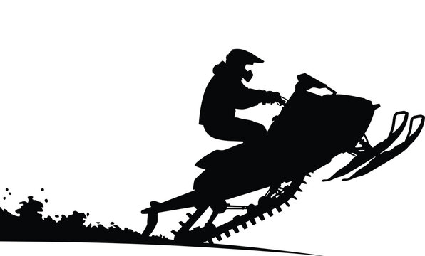 Snowmobile rider in action silhouette