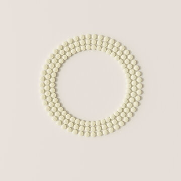 Small white dots form a connected circle on a beige background