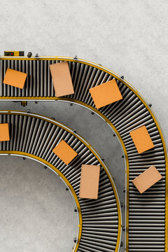3D overhead conveyor curve carrying parcels beside copy space